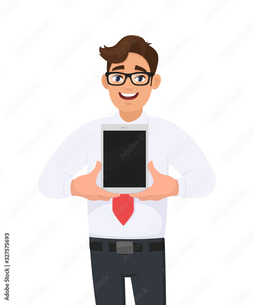 Happy business man showing a new tablet. Trendy young person holding latest digital tab. Male character design illustration. Modern lifestyle, digital technology concept in vector cartoon style.