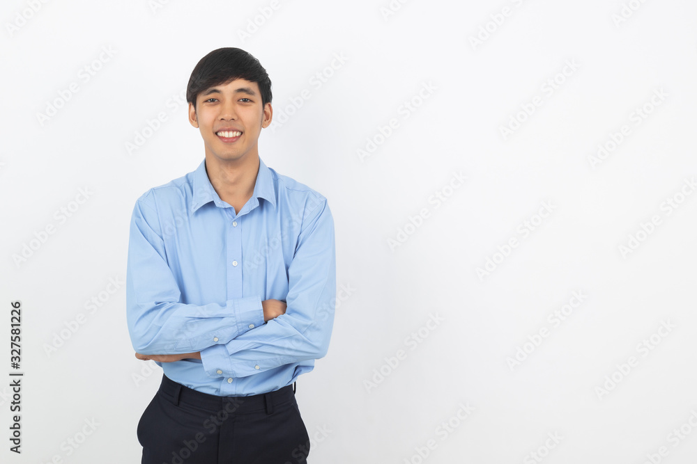 Young handsome asian business man looking to camera with arms crossed isolated on white background. Young handsome asian business man looking to camera with arms crossed isolated on white background.