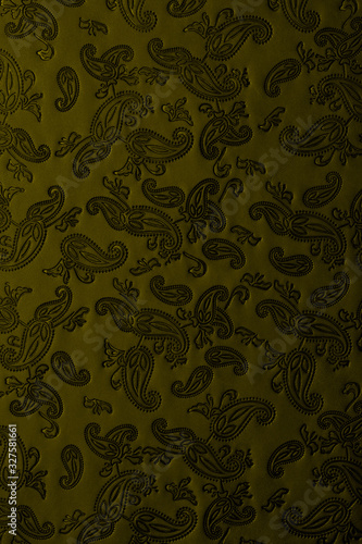 Tooled floral pattern leather texture
