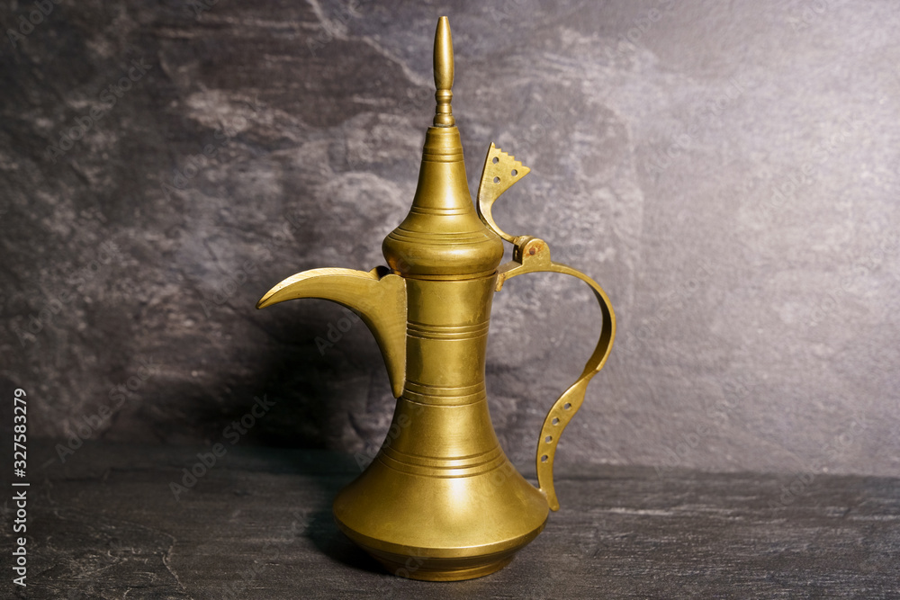 Copper kettle on a dark background. Copper kettle on a dark background.
