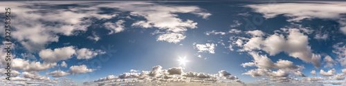 Seamless hdri panorama 360 degrees angle view blue sky with beautiful cumulus clouds with zenith for use in 3d graphics or game development as sky dome or edit drone shot