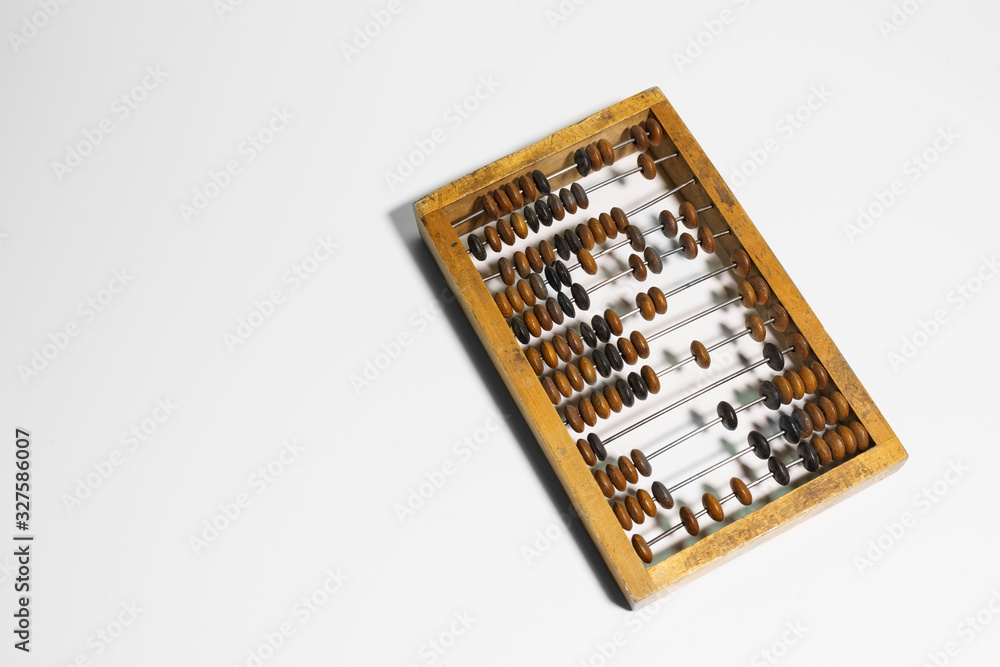 Wooden abacus on a white background. Wooden abacus on a white background.
