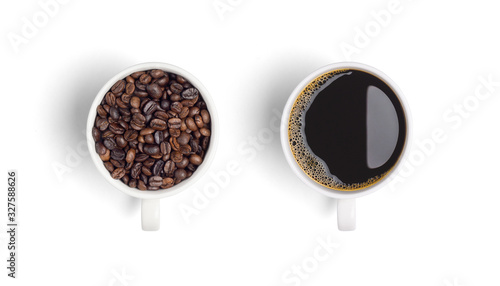 Close-up and top view of roasted coffee beans in white coffee cup and hot black coffee in white coffee cup on white background.