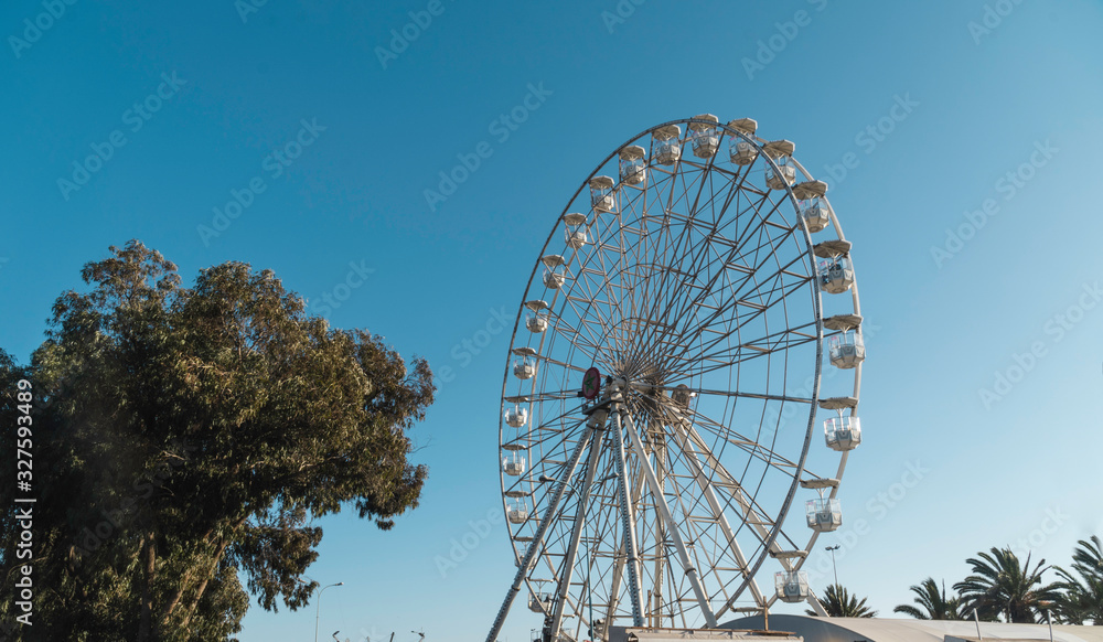 Low angle view of a ferris wheel against sky