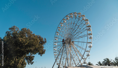 Low angle view of a ferris wheel against sky