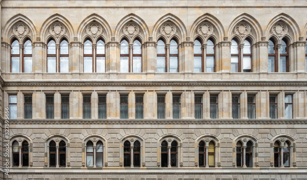 Facade of a building with a symmetrical pattern of windows