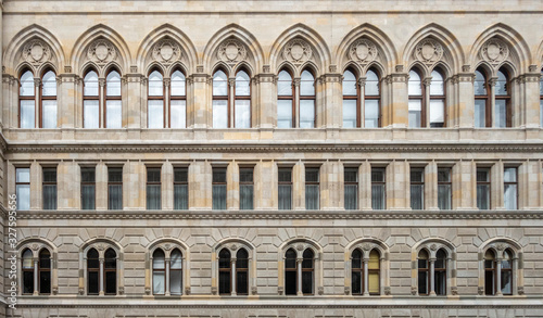 Facade of a building with a symmetrical pattern of windows