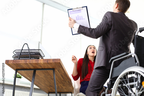 Photography Man in suit got up from wheelchair, girl in shock