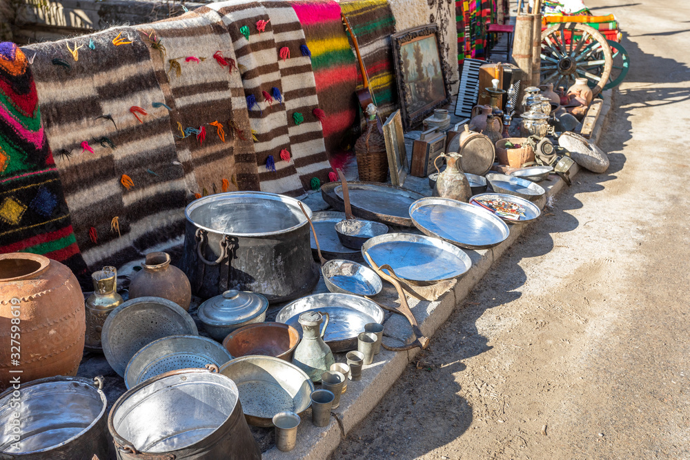 Fototapeta premium Antique jugs and dishes at the antique shop at the oriental marketplace