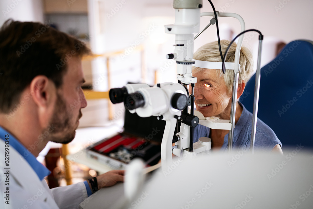 Health care, people, eyesight and technology concept Health care, people, eyesight and technology concept
