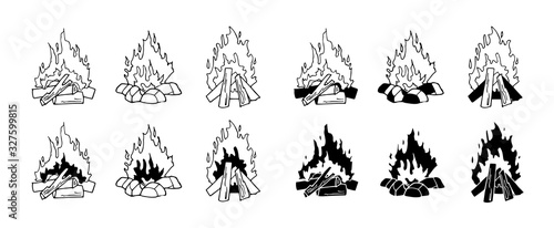 Set of monochrome vector illustrations isolated on a white background. Black and white burning bonfire. Contour and silhouettes. Outdoor adventure. Wild life. Camping hiking time.