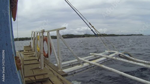 Tropical sea. View from wooden local boat Banca. Travel destinations. Summer vacations photo