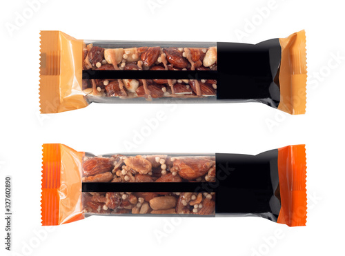 Energy nut bars packaging isolated on white background. Healthy snack for sport and fitness photo