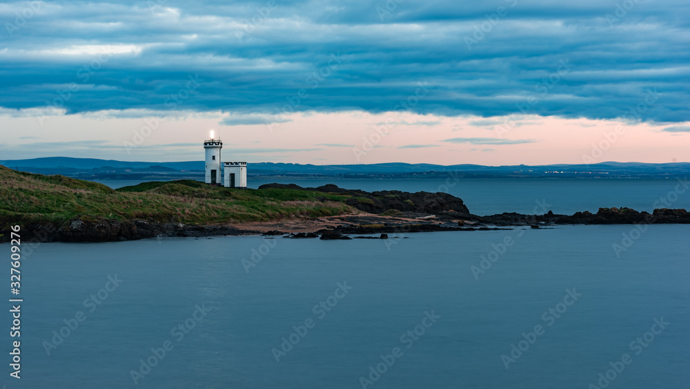 Elie cloudy sunset with lighthouse 