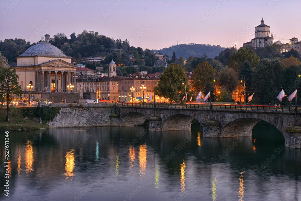 Obraz premium Panoramic night view of the city of Turin with the river Po, Italy