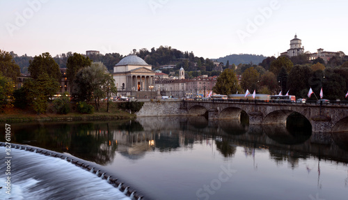 Panoramic night view of the city of Turin with the river Po, Italy