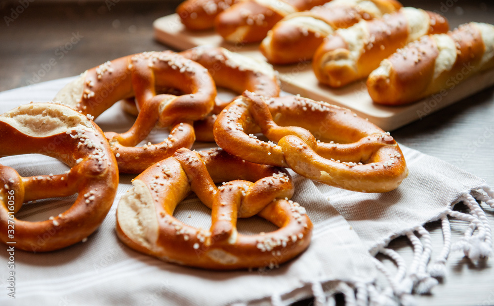 Closeup photo of lye bun and bavarian pretzel in bakery Closeup photo of lye bun and bavarian pretzel in bakery