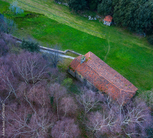 Ermita de San Emeterio, Landscape in the surroundings of the cave of the Pindal, lighthouse and hermitage of San Emeterio, Cantabrian Sea, Asturias, Spain, Europe photo