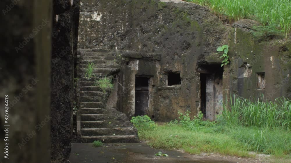 Foreground wipe reveals a war torn bunker on Corregidor Island. Foreground wipe reveals a war torn bunker on Corregidor Island.