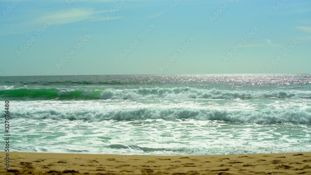 Waves crashing on a beach Waves crashing on a beach