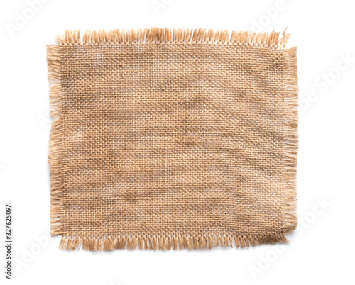 Old burlap fabric napkin, sackcloth piece isolated on white background