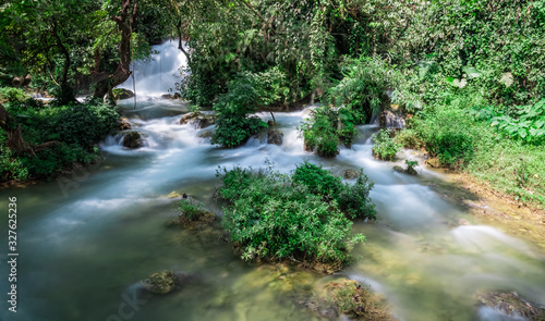 Cao Bang / Guangxi, Vietnam and China landscape. Emerald green river stream of Song Quay Son river, border of Northern Vietnam and China. Close to Ban Gioc and Detian waterfall. 