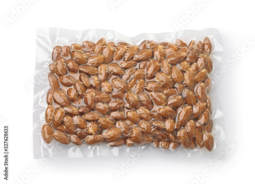 Vacuum plastic bag of almonds photo