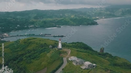 Cinematic aerial drone video of a romantic lighthouse of Basco Batanes in the Philippines. photo