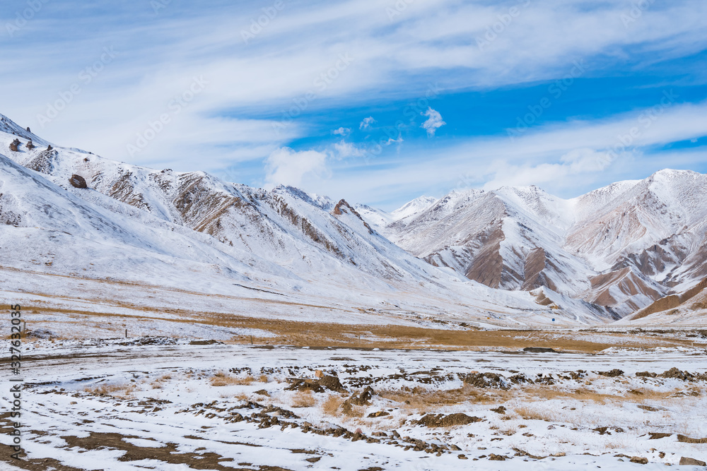 the gravel road on the snow mountain