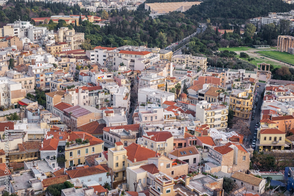 Naklejka premium Aerial view of preserved historic buildings in the Plaka neighborhood of Athens, on the slopes of Acropolis, Greece