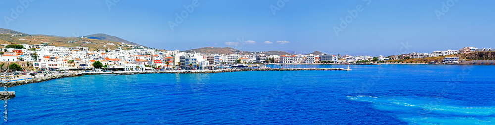 superb panoramic view of the port of Tinos, magnificent Cyclades island in the heart of the Aegean Sea, dominated by the Panaghia Evangélistria Church