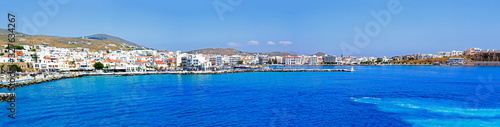 superb panoramic view of the port of Tinos, magnificent Cyclades island in the heart of the Aegean Sea, dominated by the Panaghia Evangélistria Church
