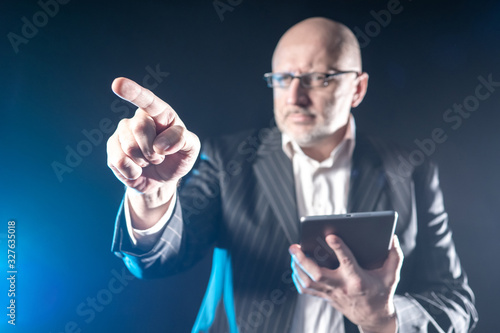 Gloomy businessman shows a ...