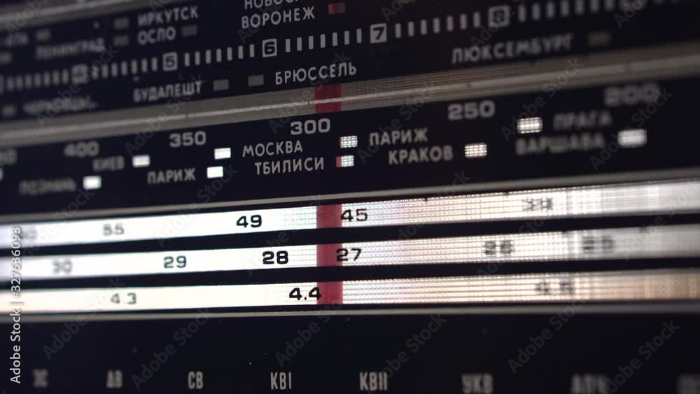 Tuning Analog Radio Dial Frequency on Scale of the Vintage Receiver. Close-up. Radio frequency receiver/ 4k Tuning Analog Radio Dial Frequency on Scale of the Vintage Receiver. Close-up. Radio frequency receiver/ 4k