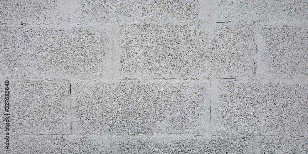 Grey brick cinder block wall background concrete tile cladding seamless