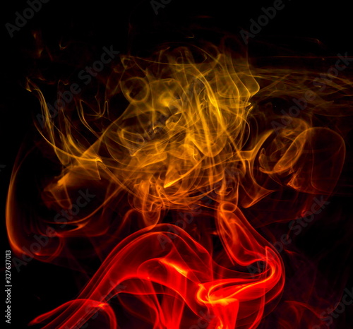 Colored smoke on black background