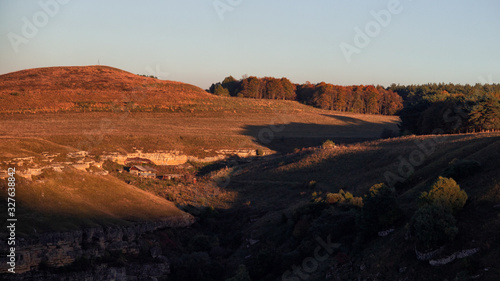 Mountain hut at sunset