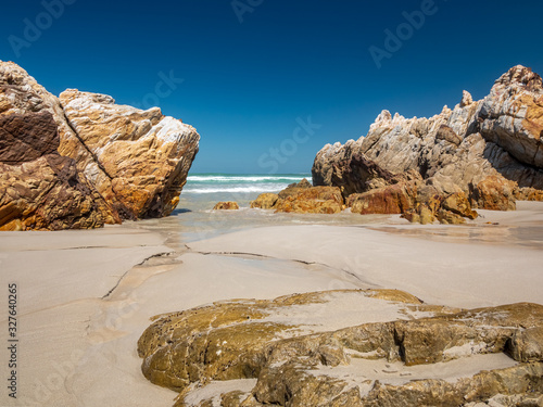 South Africa rocky beach with crystal clear water