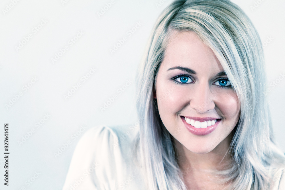 Fototapeta premium Portrait of Beautiful Blonde Girl Young Woman With Perfect Teeth
