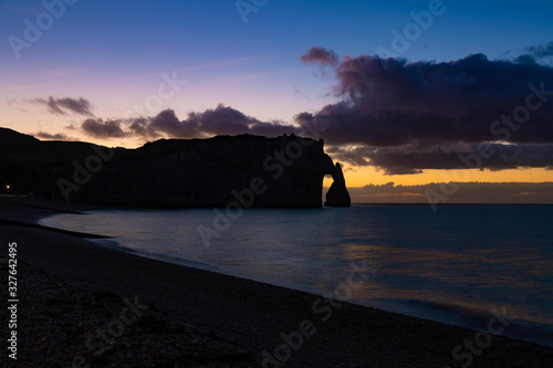 Etretat, Normandy, France - The famous cliffs with its natural arch, by night