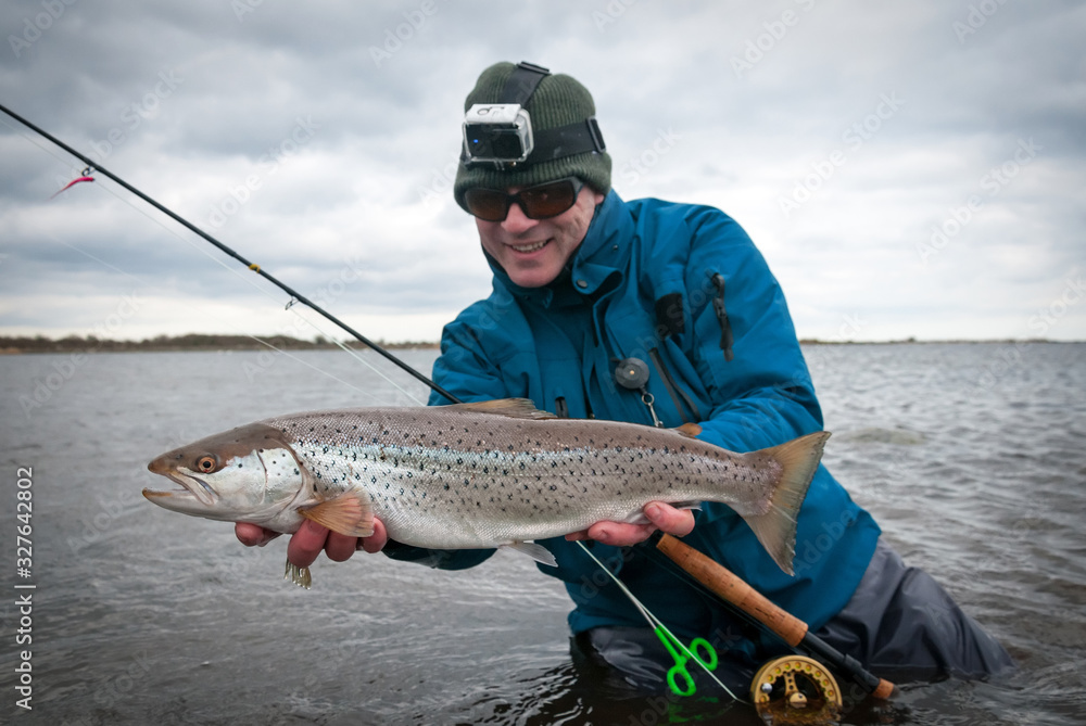Beautiful silver sea trout fishing trophy Beautiful silver sea trout fishing trophy