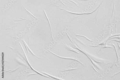 Crumpled white paper. Abstract background for the designer. photo