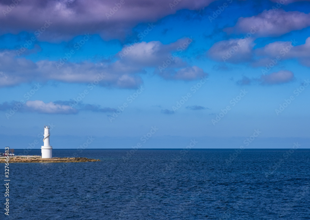 White lighthouse in La Savina, Formentera island, Balearic, Spain