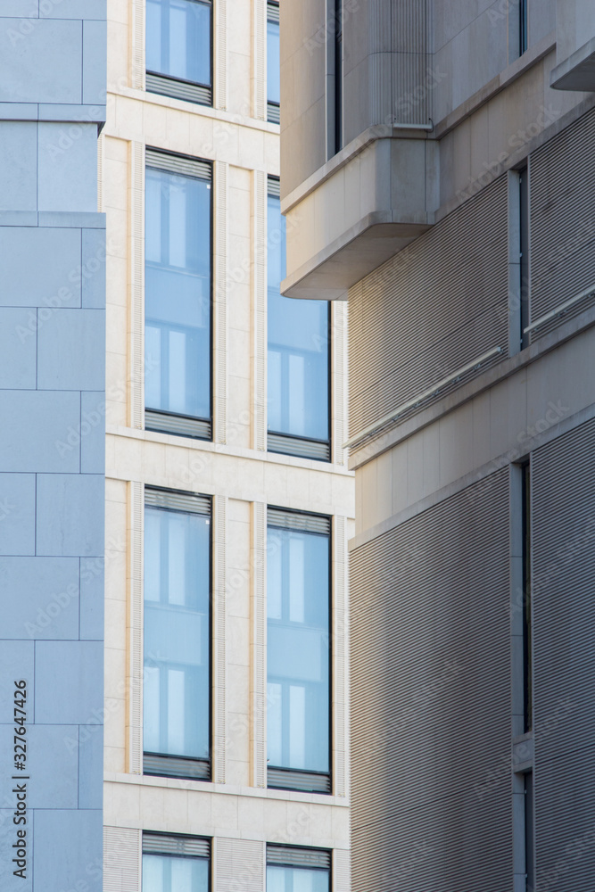 The gray building. Geometric figures.