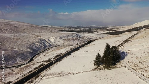 Aerial sequence of fresh snow on the famous Glenshane Pass within the Sperrins of N. Ireland, the main route between Belfast and Derry photo