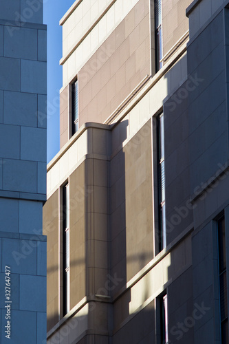 The gray building. Geometric figures.