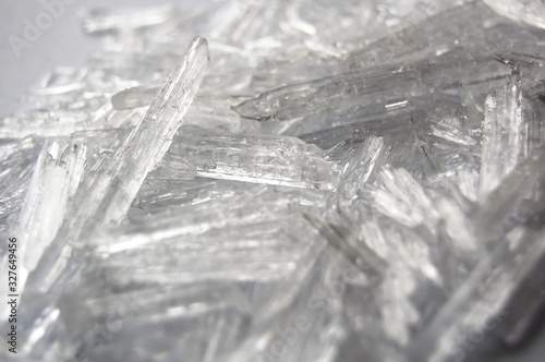 Macro background of natural menthol crystals, made of mint ingredient.  Ice, winter and  cold concept.