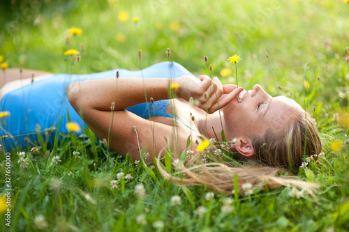 Beautiful young woman relaxing in the nature