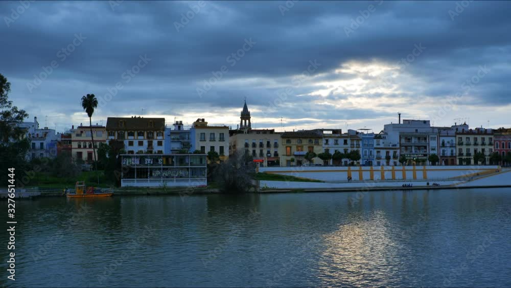 River Sunset Timelapse 4k in Seville Spain City Center with Tourists Visiting the City. River Sunset Timelapse 4k in Seville Spain City Center with Tourists Visiting the City.