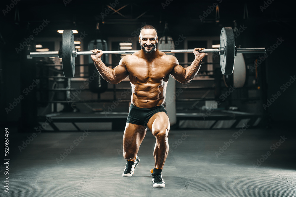 bodybuilder fitness man pumping up legs muscles bodybuilder fitness man pumping up legs muscles